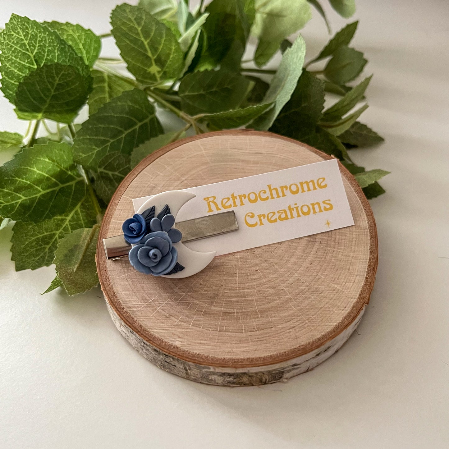 White moon hair clip with blue floral details | 1.75" alligator clip