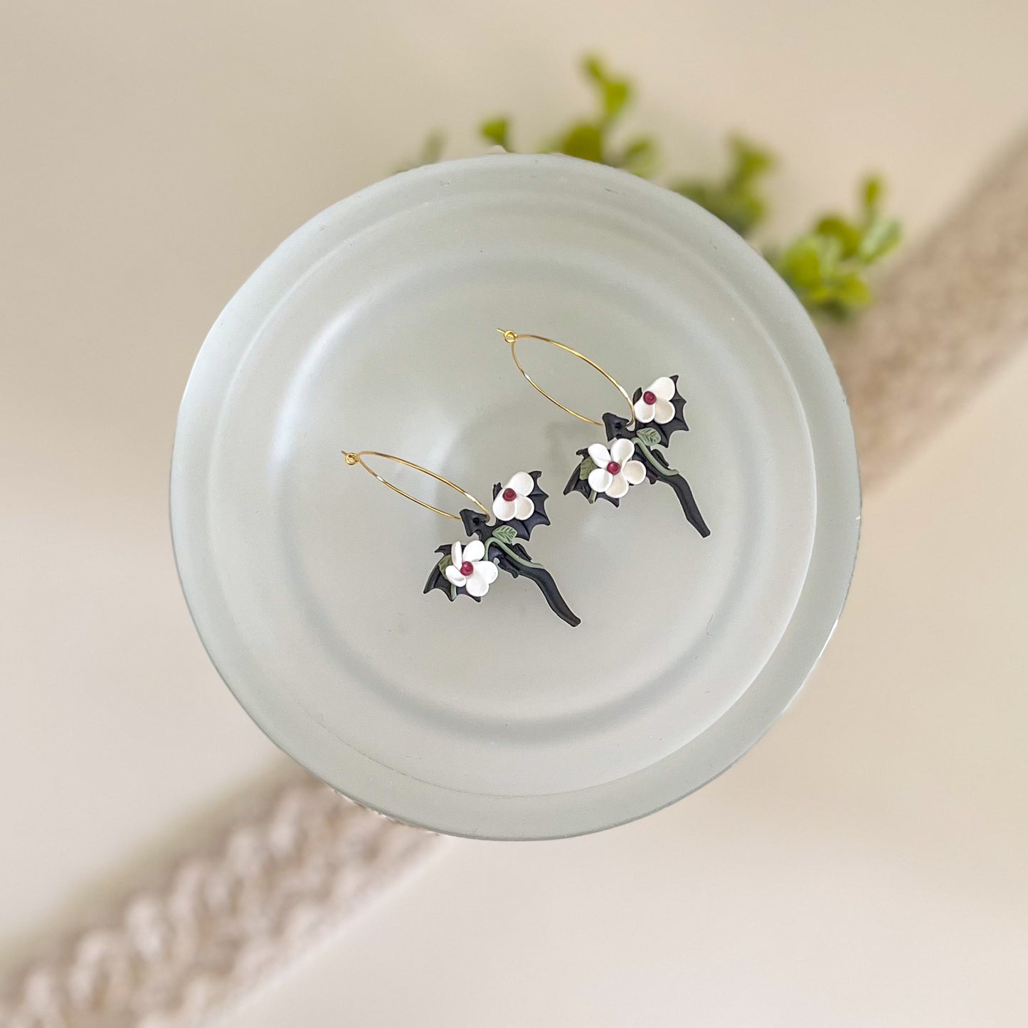 Small black dragon hoop with white floral details | 18k gold plated