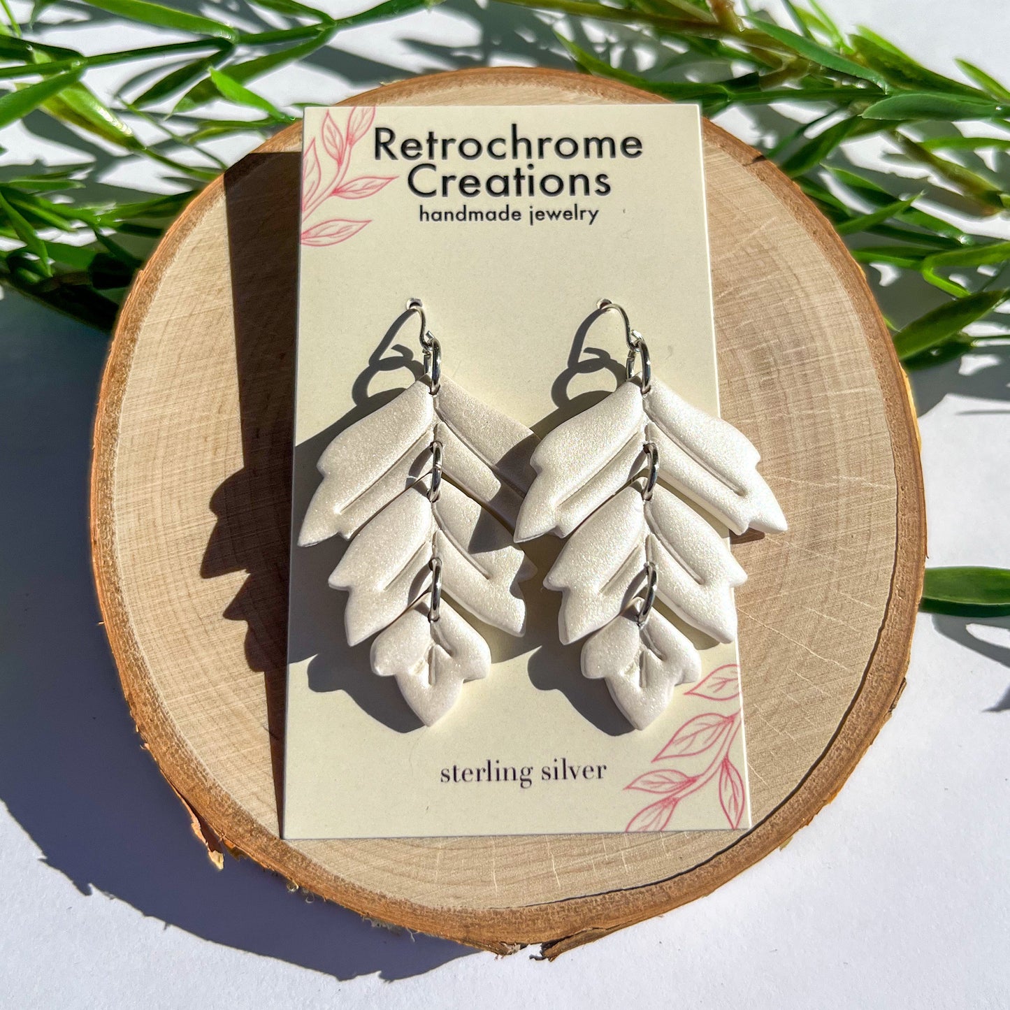Shiny white leaf dangles | sterling silver