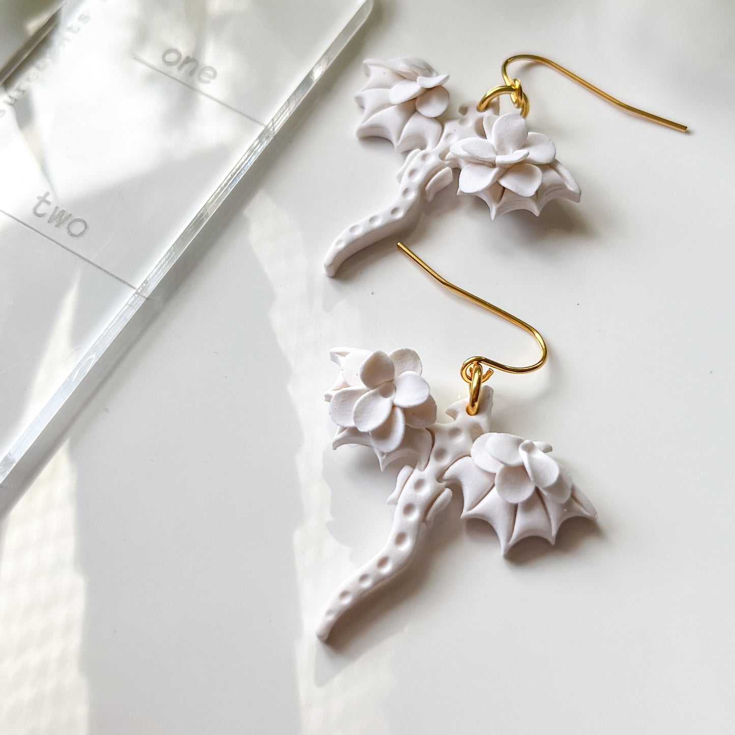 White monochrome dragon earrings | 18k gold plated