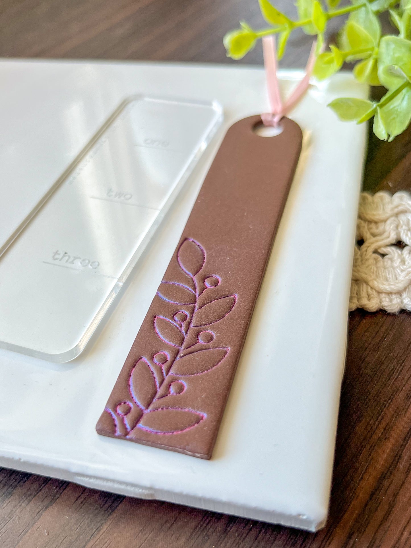 Brown and pink embossed bookmark