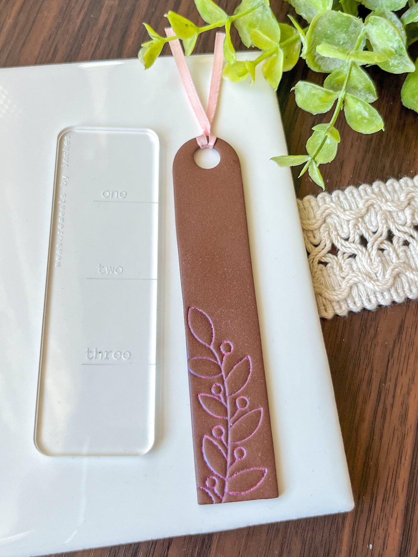 Brown and pink embossed bookmark