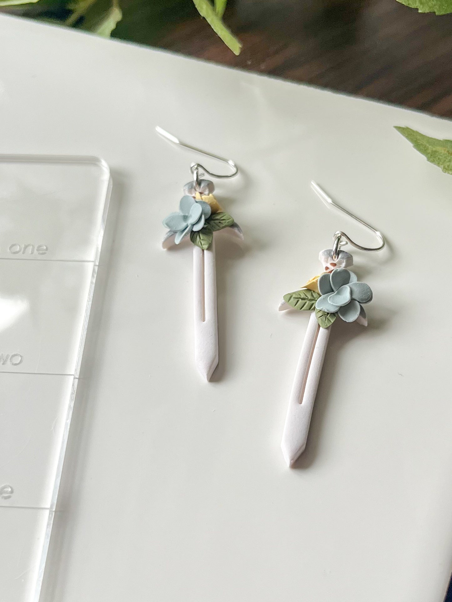 white sword earrings with blue and yellow flowers | sterling silver