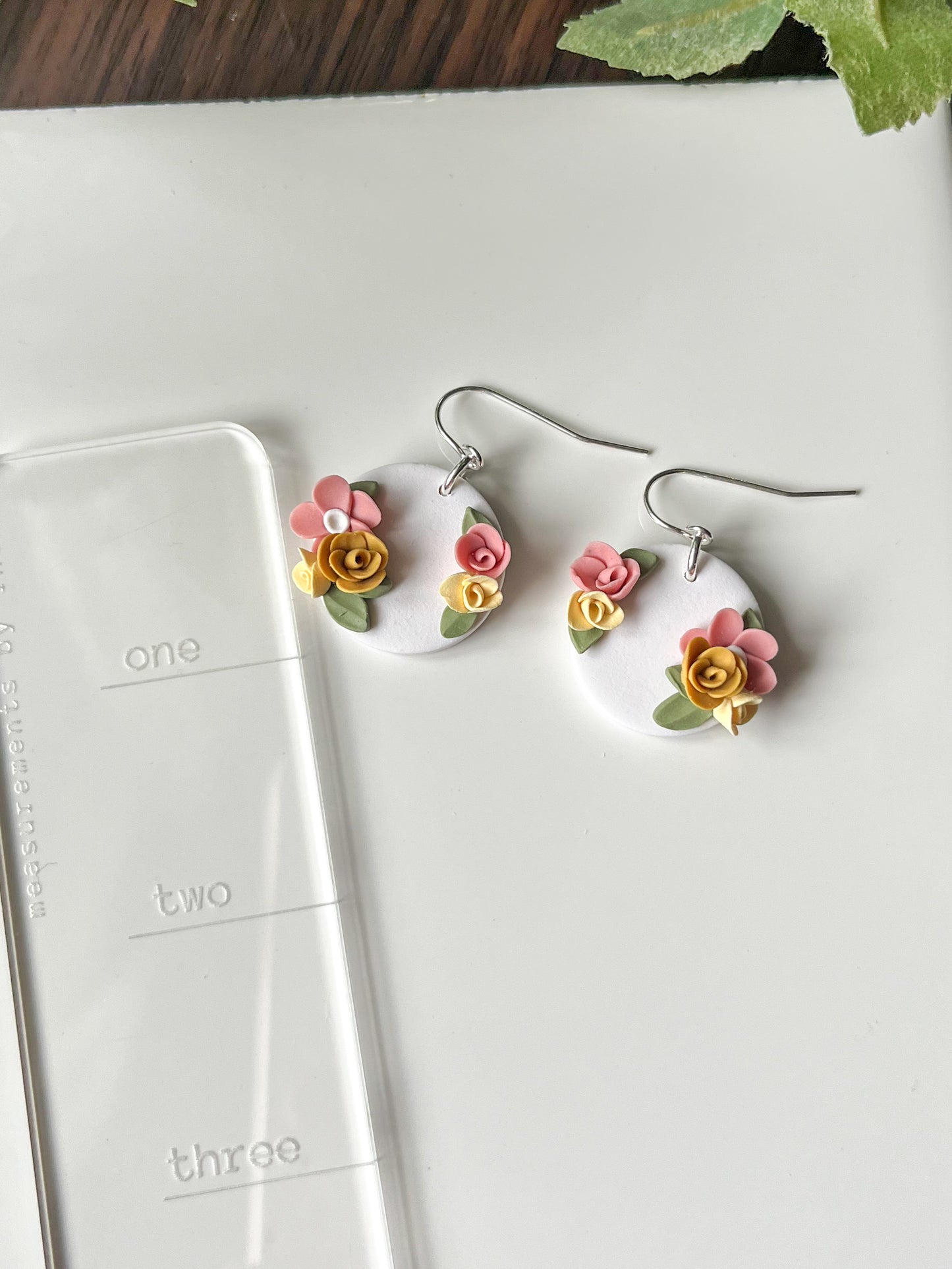 Small white medallion earrings with pink and yellow flowers | sterling silver