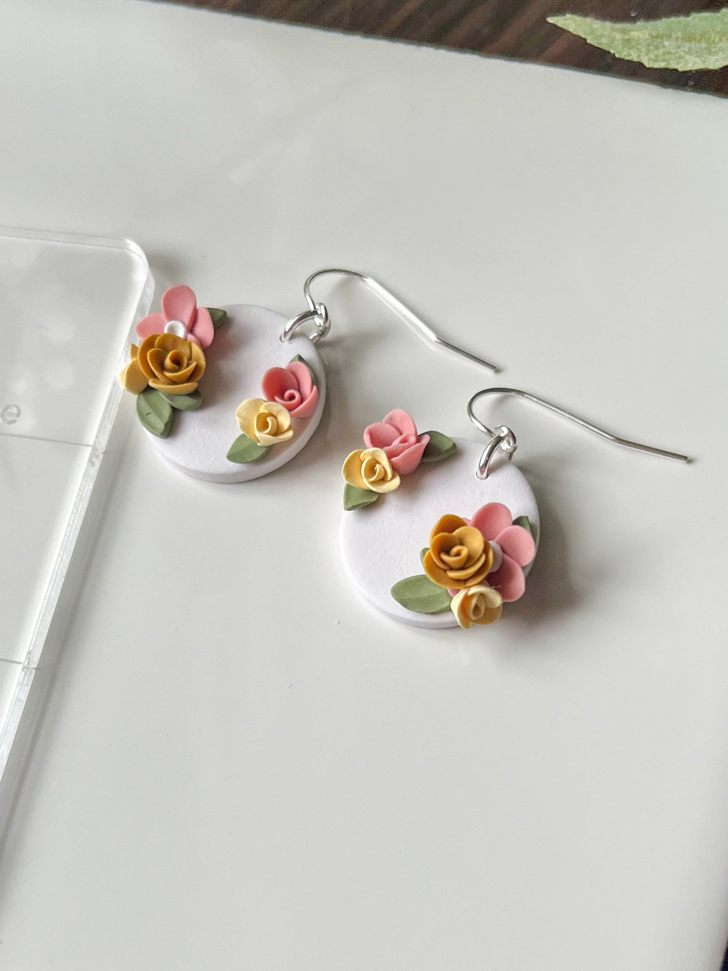 Small white medallion earrings with pink and yellow flowers | sterling silver