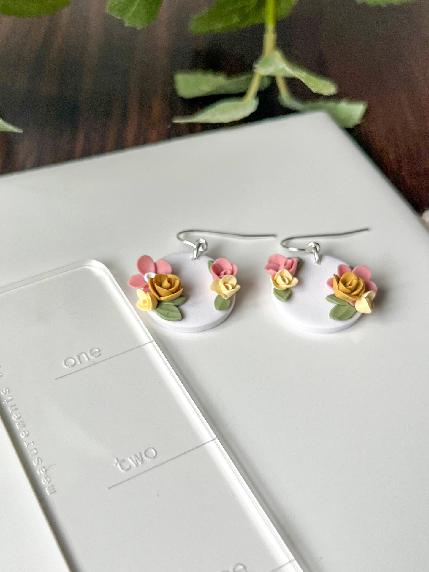 Small white medallion earrings with pink and yellow flowers | sterling silver