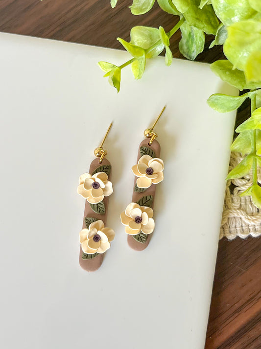 Long oval earrings in brown with white flowers | 24k gold plated