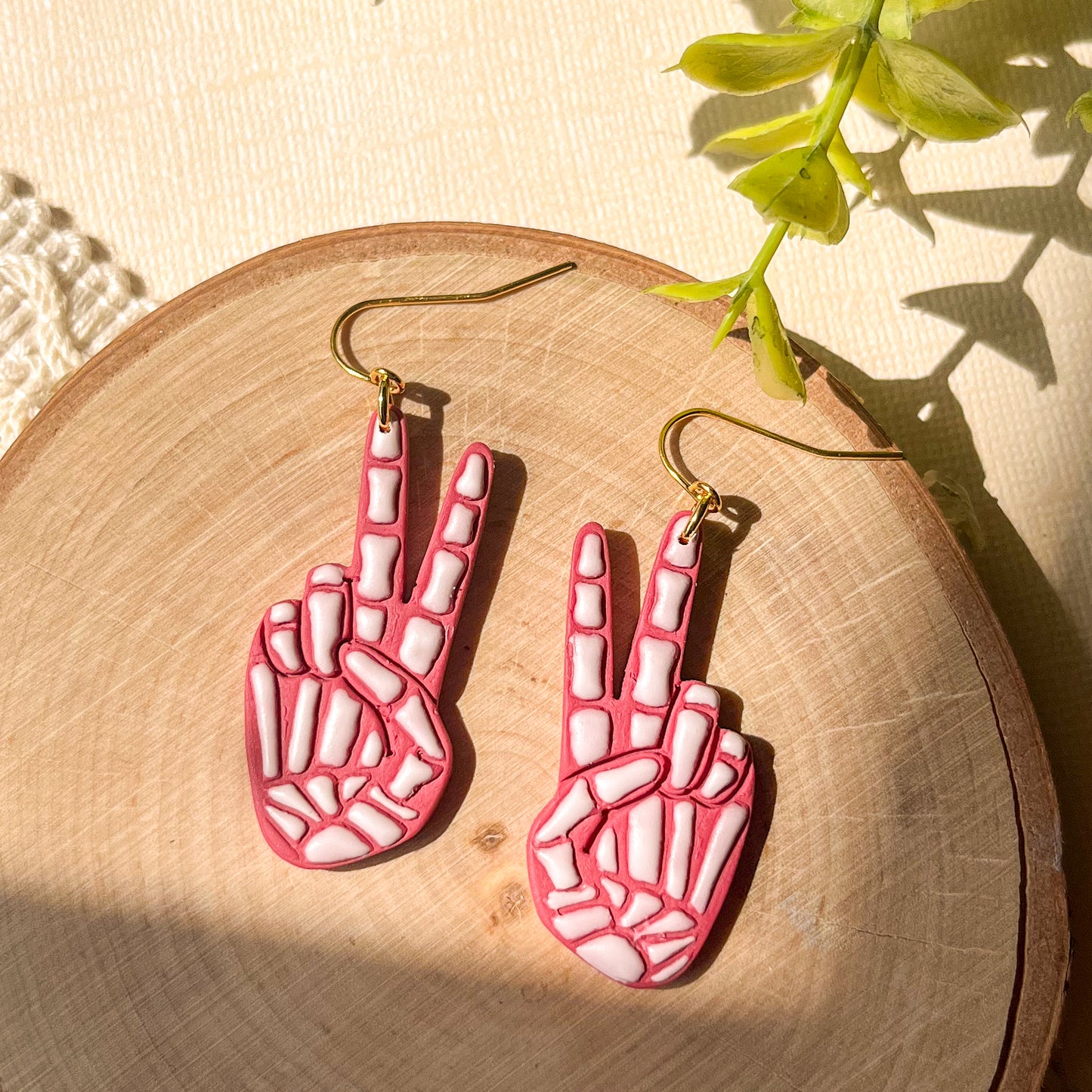 Red skeleton peace hand earrings | 18k gold plated